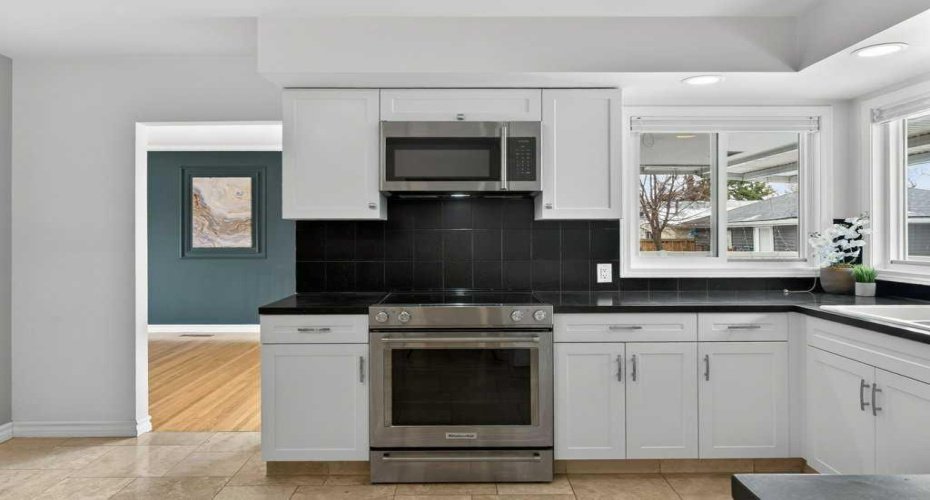 425 Woodland Crescent, Calgary, Alberta T2J 1J7, 4 Bedrooms Bedrooms, ,2 BathroomsBathrooms,Residential,For Sale,Woodland,A2296843