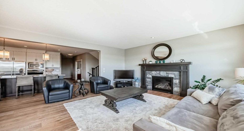 Main floor living room with cozy gas fireplace!
