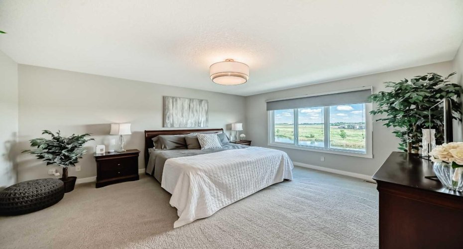 The primary bedroom will easily fit your King Sized bed!