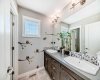 The upper level main floor bath has dual sinks! Another great feature of this beautiful property!