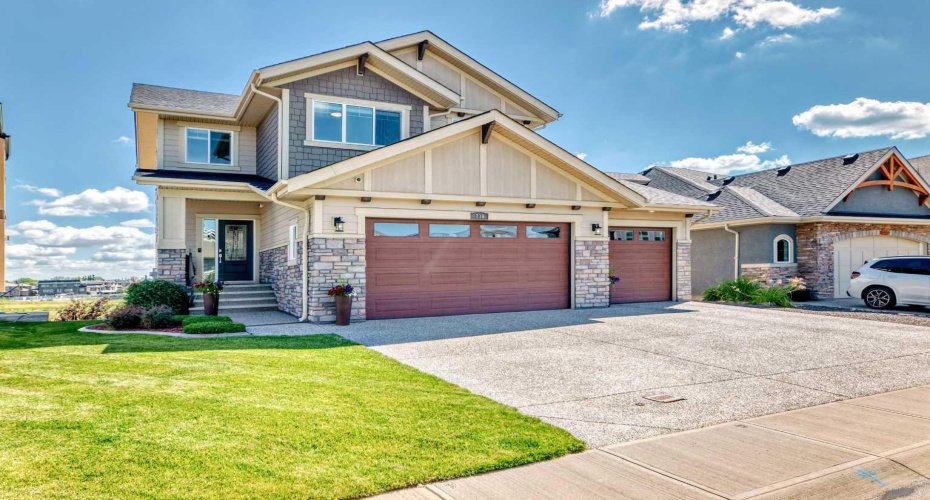 Exposed Aggregate Driveway! Fully Developed Walk Out Basement!