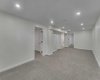open / new developed  rec room  with lots of pot lights  in basement