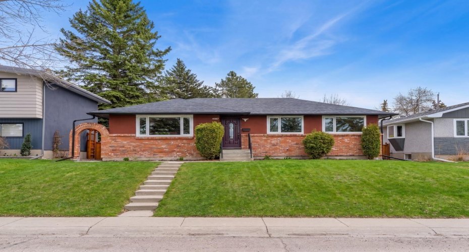 well- built bungalow with new built carriage house  at the back  in Charleswood