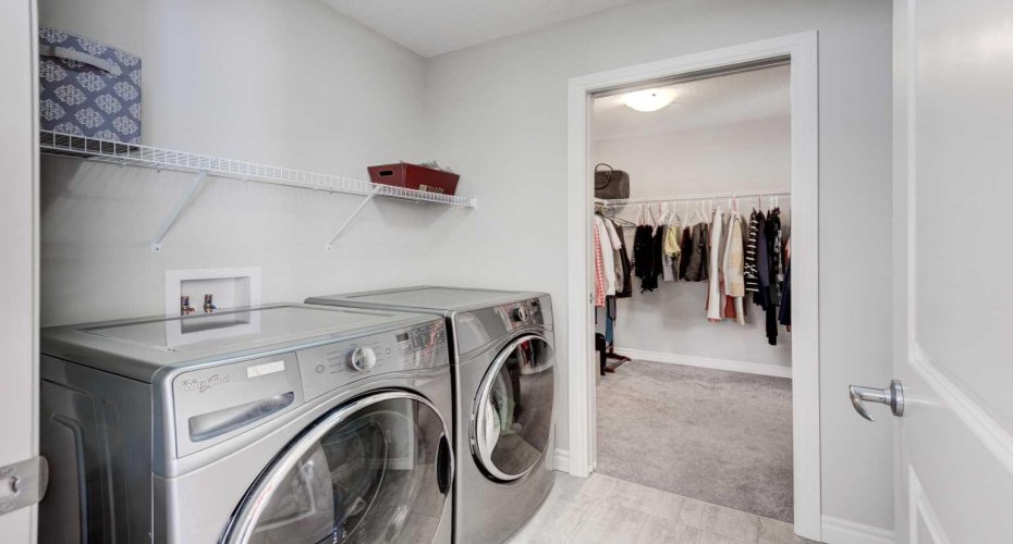 Laundry room has direct access to ensuite walk-in closet