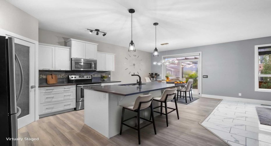 156 Rainbow Falls Heath, Chestermere, Alberta T1X0S7, 5 Bedrooms Bedrooms, ,4 BathroomsBathrooms,Residential,For Sale,Rainbow Falls,A2297410