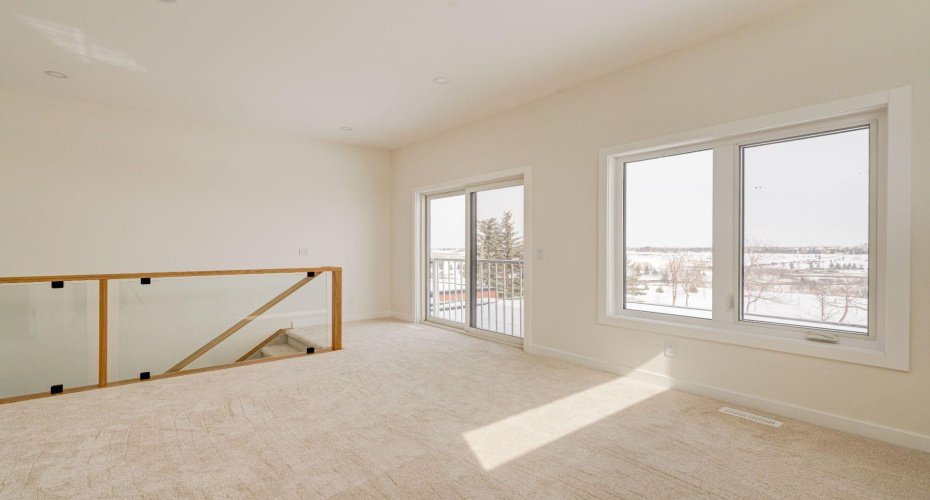 Third Floor Family Room with Private Balcony and Park Views