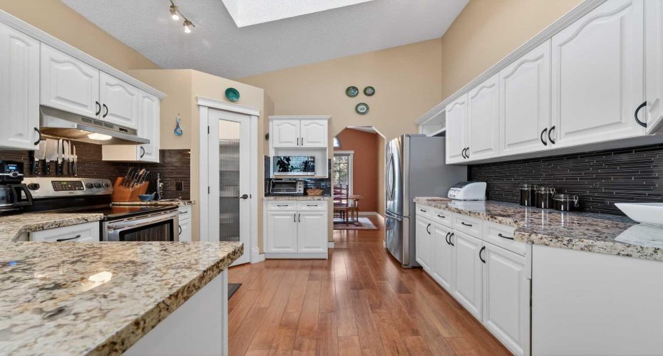 118 Douglas Woods Hill, Calgary, Alberta T2Z 2G6, 4 Bedrooms Bedrooms, ,3 BathroomsBathrooms,Residential,For Sale,Douglas Woods,A2288887