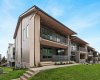 Welcome to 605 Sovereign Common SW. Exterior virtually edited for summer inspiration. Landscaping to be complete as weather permits.