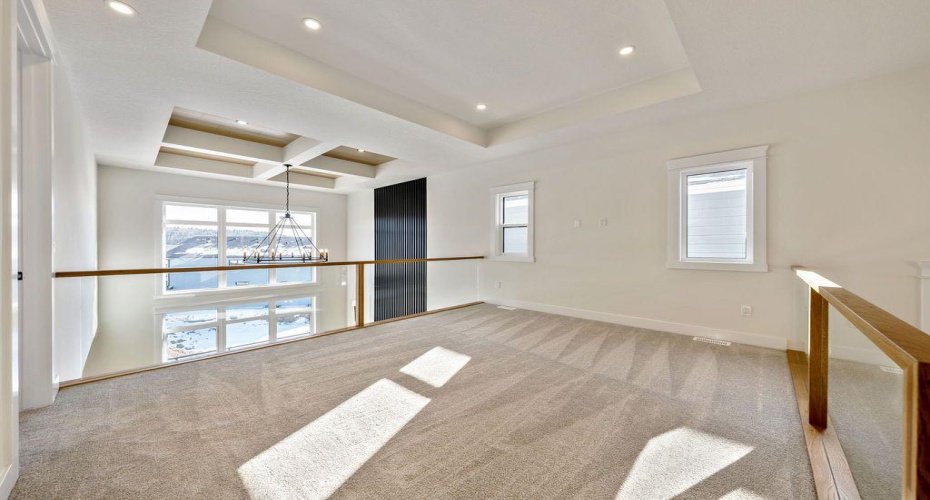 Bonus room with open to below and natural lighting