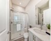 Main Floor Full Bath • PLEASE NOTE: Photos are of a DIFFERENT Spec Home of the same model – fit and finish may differ. Interior selections and floorplans shown in photos.