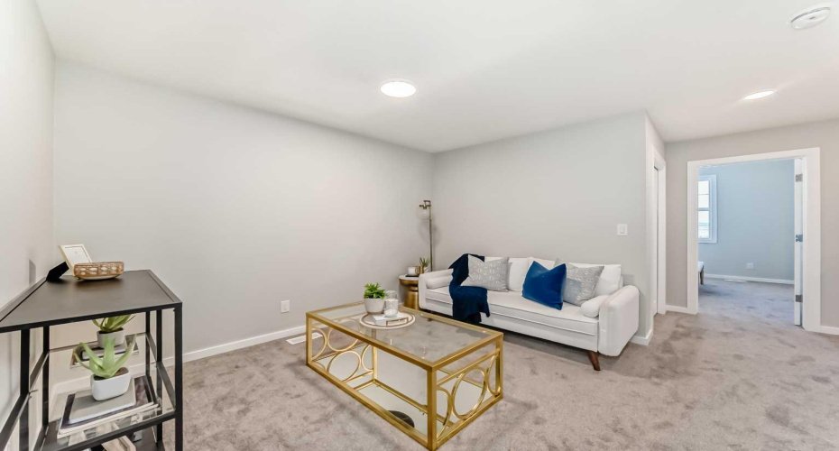 Upper Floor Bonus Room • PLEASE NOTE: Photos are of a DIFFERENT Spec Home of the same model – fit and finish may differ. Interior selections and floorplans shown in photos.