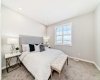Master Bedroom • PLEASE NOTE: Photos are of a DIFFERENT Spec Home of the same model – fit and finish may differ. Interior selections and floorplans shown in photos.