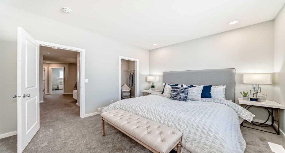Master Bedroom • PLEASE NOTE: Photos are of a DIFFERENT Spec Home of the same model – fit and finish may differ. Interior selections and floorplans shown in photos.