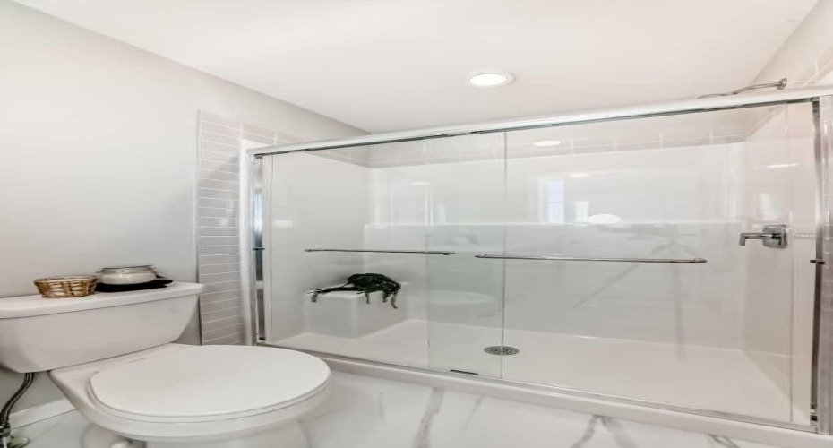 Master Ensuite • PLEASE NOTE: Photos are of a DIFFERENT Spec Home of the same model – fit and finish may differ. Interior selections and floorplans shown in photos.