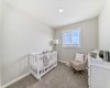 Upper Floor Bedroom Three • PLEASE NOTE: Photos are of a DIFFERENT Spec Home of the same model – fit and finish may differ. Interior selections and floorplans shown in photos.
