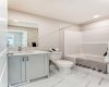 Upper Floor Main Bath • PLEASE NOTE: Photos are of a DIFFERENT Spec Home of the same model – fit and finish may differ. Interior selections and floorplans shown in photos.