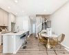 Kitchen & Dining Area • PLEASE NOTE: Photos are of a DIFFERENT Spec Home of the same model – fit and finish may differ. Interior selections and floorplans shown in photos. Kitchen appliances are included, and will be installed prior to possession.