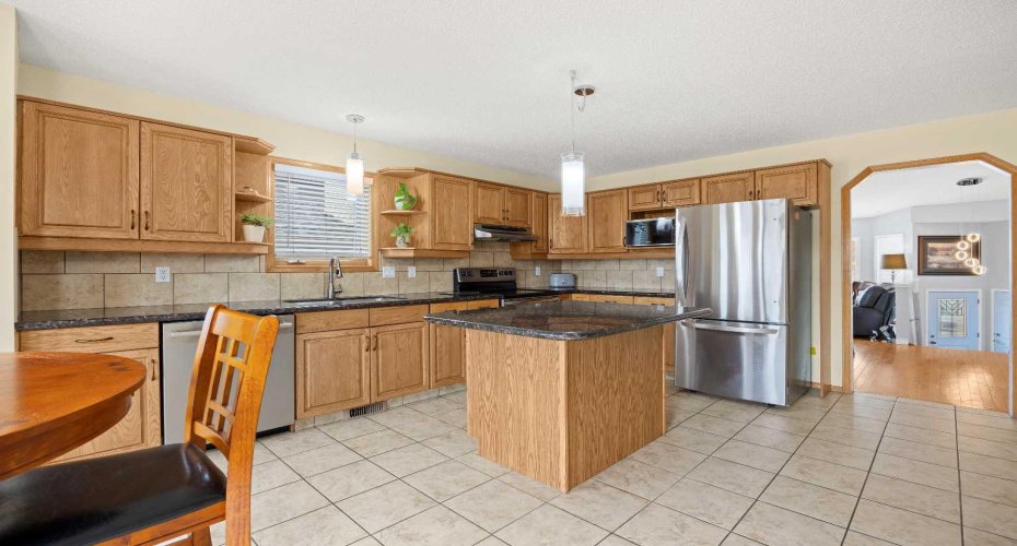 1331 Sunvista Way, Calgary, Alberta T2X 3G5, 4 Bedrooms Bedrooms, ,3 BathroomsBathrooms,Residential,For Sale,Sunvista,A2295835