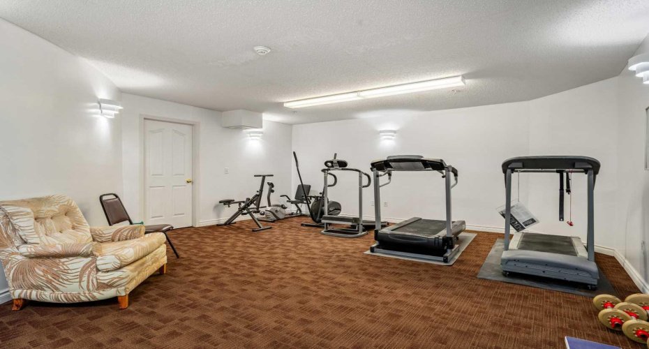 Fitness room with kitchen area