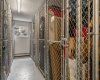 Titled storage cage next to unit