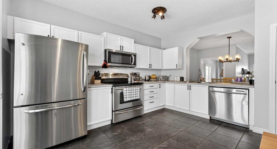 10796 Hidden Valley Drive, Calgary, Alberta T3A 5H6, 4 Bedrooms Bedrooms, ,4 BathroomsBathrooms,Residential,For Sale,Hidden Valley,A2297888