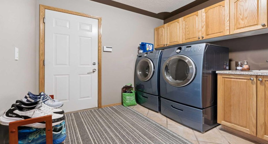 Main Floor Laundry and Storage w access to garage
