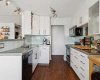 The kitchen has been updated and offers plenty of prep space and storage.