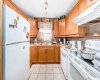 243 Erin Meadow Close, Calgary, Alberta T2B 3E6, 4 Bedrooms Bedrooms, ,2 BathroomsBathrooms,Residential,For Sale,Erin Meadow,A2300135