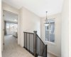 Thoughtfully designed staircase with a window that fills the space with natural light...
