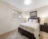 One of the generously sized upstairs bedrooms...