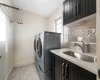 Upper-level laundry room for added everyday convenience...