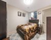 One of the two spacious basement bedrooms...