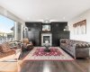 Bright and airy living room with large windows inviting abundant sunlight...