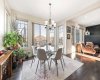 Dining area opens to the deck, creating a larger space for summer gatherings...
