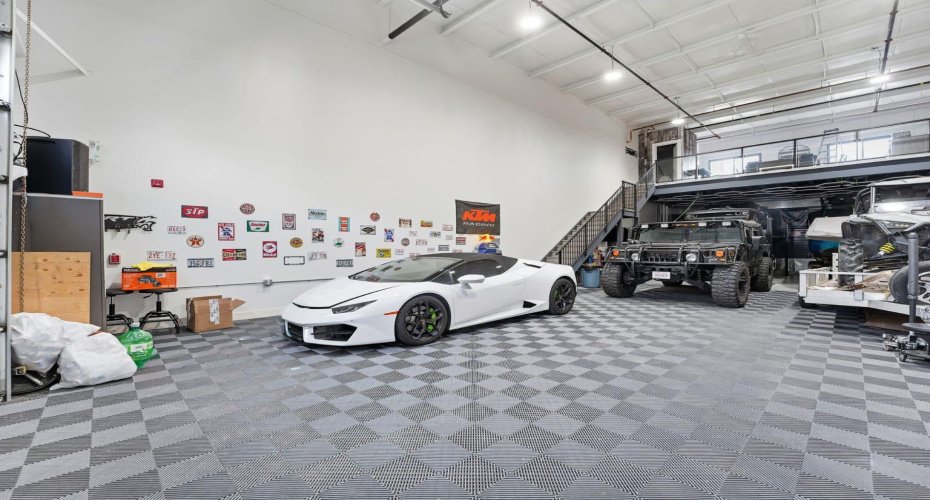 Ample space for luxury car storage and display.