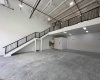 Mid construction with mezzanine and stairs in