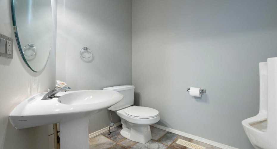 please note wall hung urinal  on the right