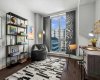The second bedroom works just as well as a home office or reading room as it does a guest space. A city view through the window, hardwood floors, and enough room for a proper desk setup make working from home genuinely comfortable.