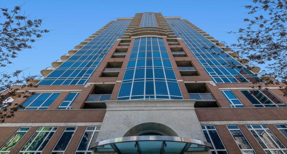 Looking straight up at The Montana from street level, the scale and quality of the curtain wall glass and brick construction become clear. Concrete built, well maintained, and designed to last, this building has held its standing in Calgary's inner city for good reason. Thank you for viewing!
