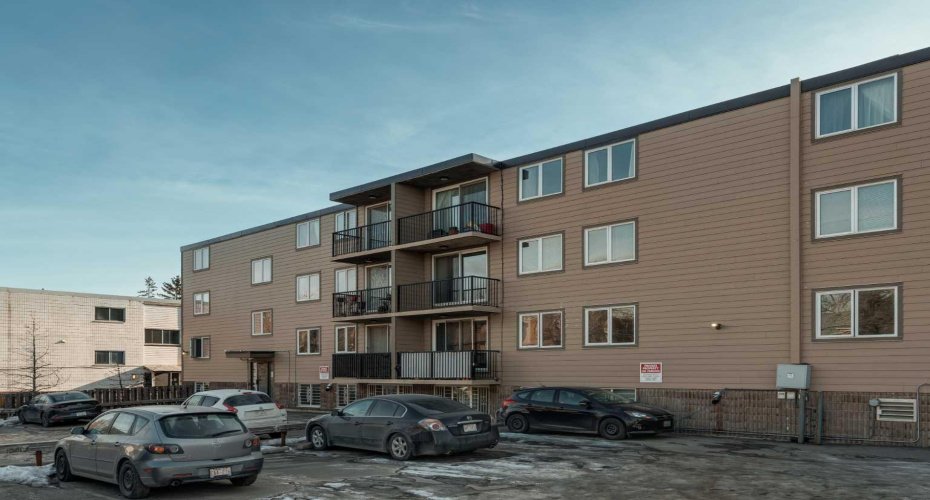 Rear of building with assigned surface parking