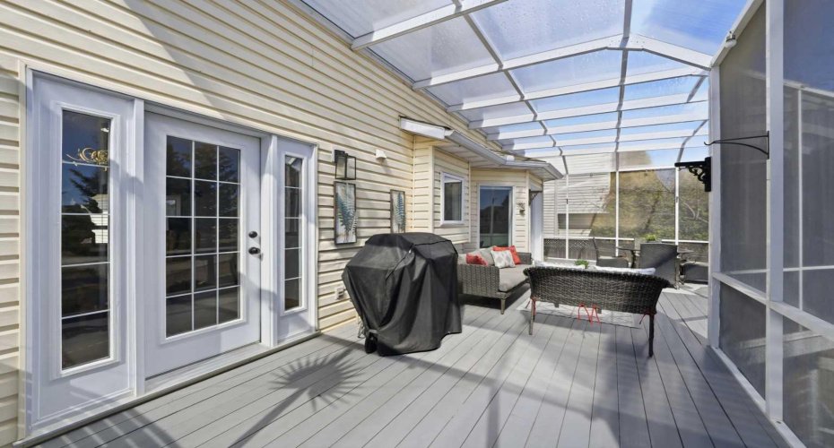 A newly installed sunroom roof adds peace of mind along with enhanced brightness and clarity.