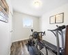 Flexible upper level third bedroom, currently a gym and ideal for a home office.