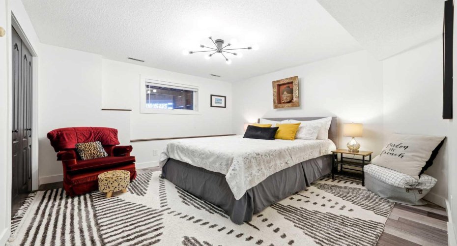 Spacious lower level bedroom.