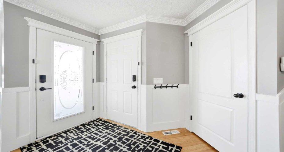 Classic wainscoting details elevate the space.