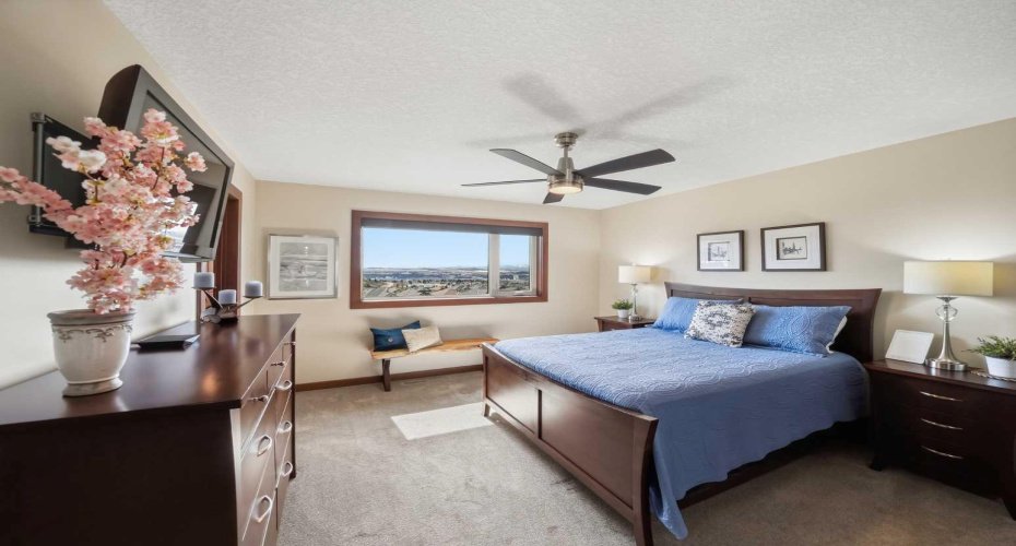 Primary Bedroom with Mountain Views, Walk-In Closet, and Dual Blinds (Blackout and Solar Shades)