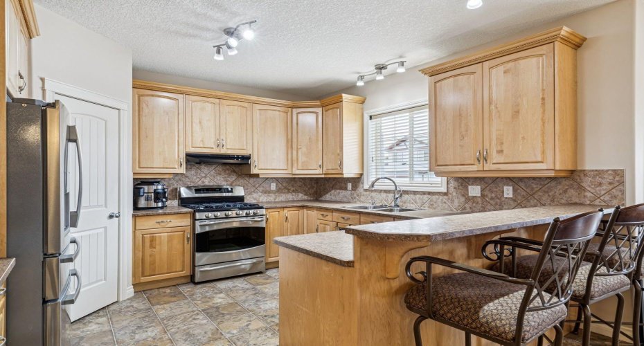 937 Cimarron Park Close, Okotoks, Alberta T1S2E6, 4 Bedrooms Bedrooms, ,3 BathroomsBathrooms,Residential,For Sale,Cimarron Park,A2301302