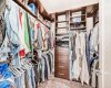 Large Walk-in Closet with Built-ins