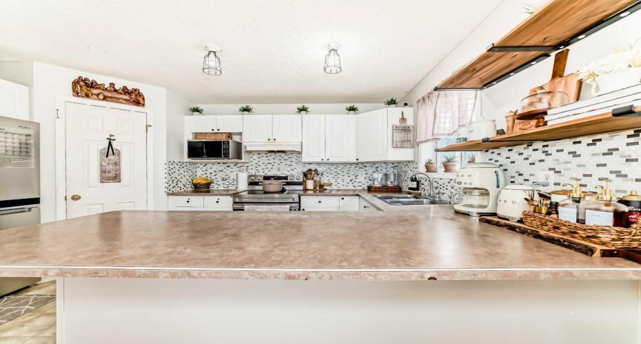 155 Erin Meadow Way, Calgary, Alberta T2B 3P7, 5 Bedrooms Bedrooms, ,3 BathroomsBathrooms,Residential,For Sale,Erin Meadow,A2297998