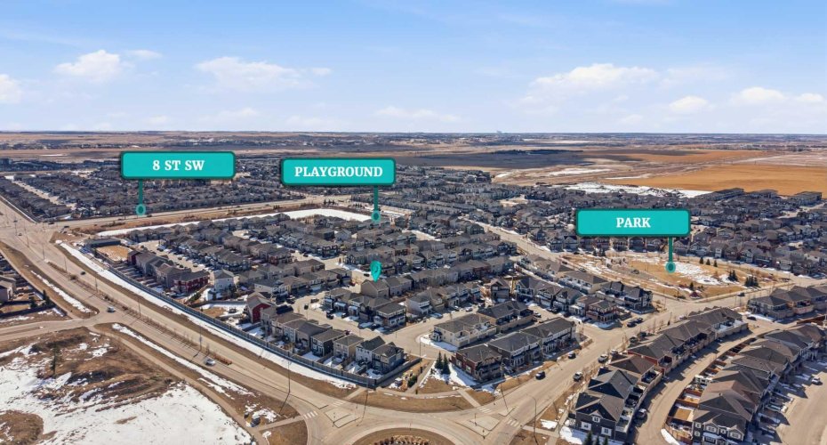 Drone photos included to highlight the showcasing nearby 8th Street , green spaces, Playground, Park and the surrounding community that make this location so desirable