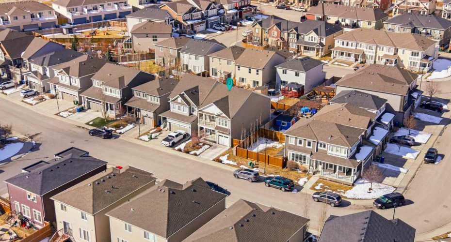 Drone photos included to highlight the fantastic neighbourhood—showcasing nearby pathways, green spaces, and the surrounding community that make this location so desirable